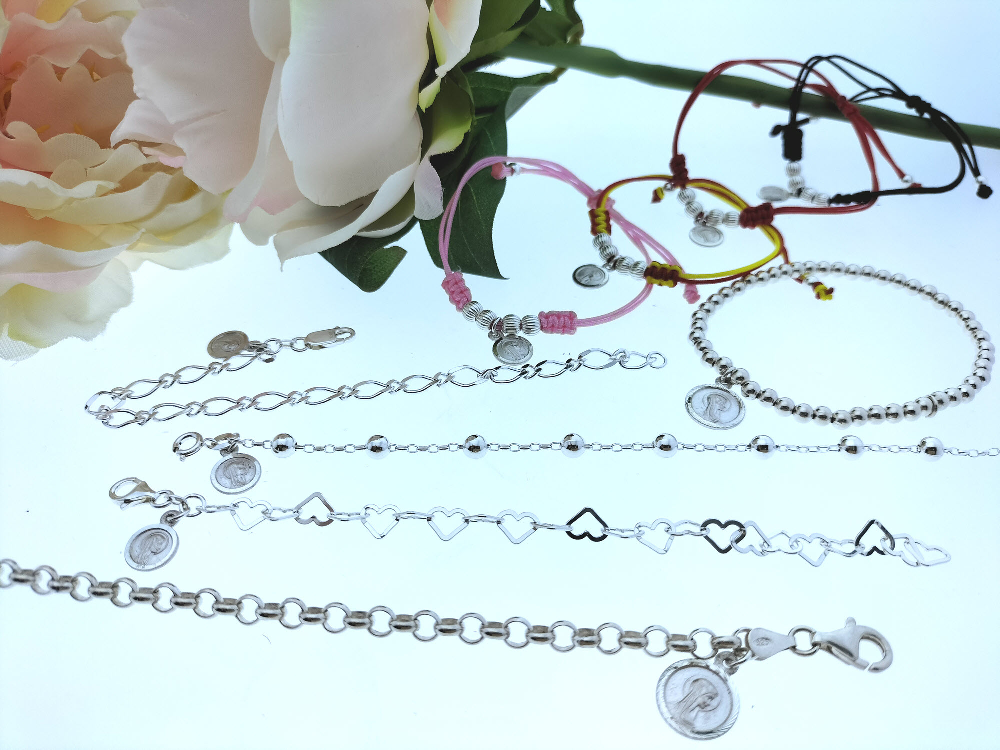 Pulseras religiosas de plata